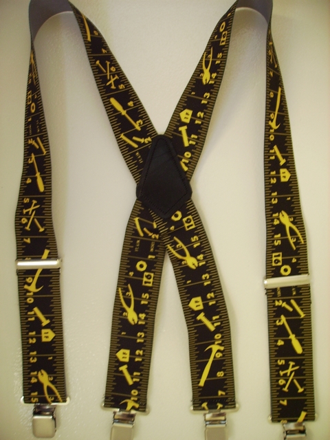 TAPE MEASURE 2"X48" Black with Yellow. Black Center Suspenders with 4 strong 1"x 1" Grips and 2 Length Adjusters in the front, all in NICKEL FINISH. Entirely Stretchable Cotton/Polyester Material. UA450N48TMBL
